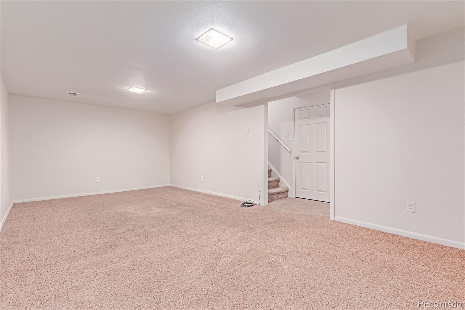 1285 Elder Street Denver, CO 80221 - Photo 21 of 35 an empty room with an entryway
