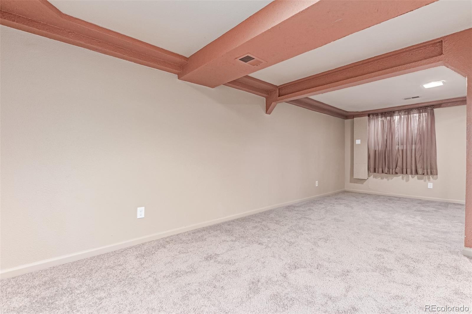 1285 Elder Street Denver, CO 80221 - Photo 23 of 35 an empty room with windows