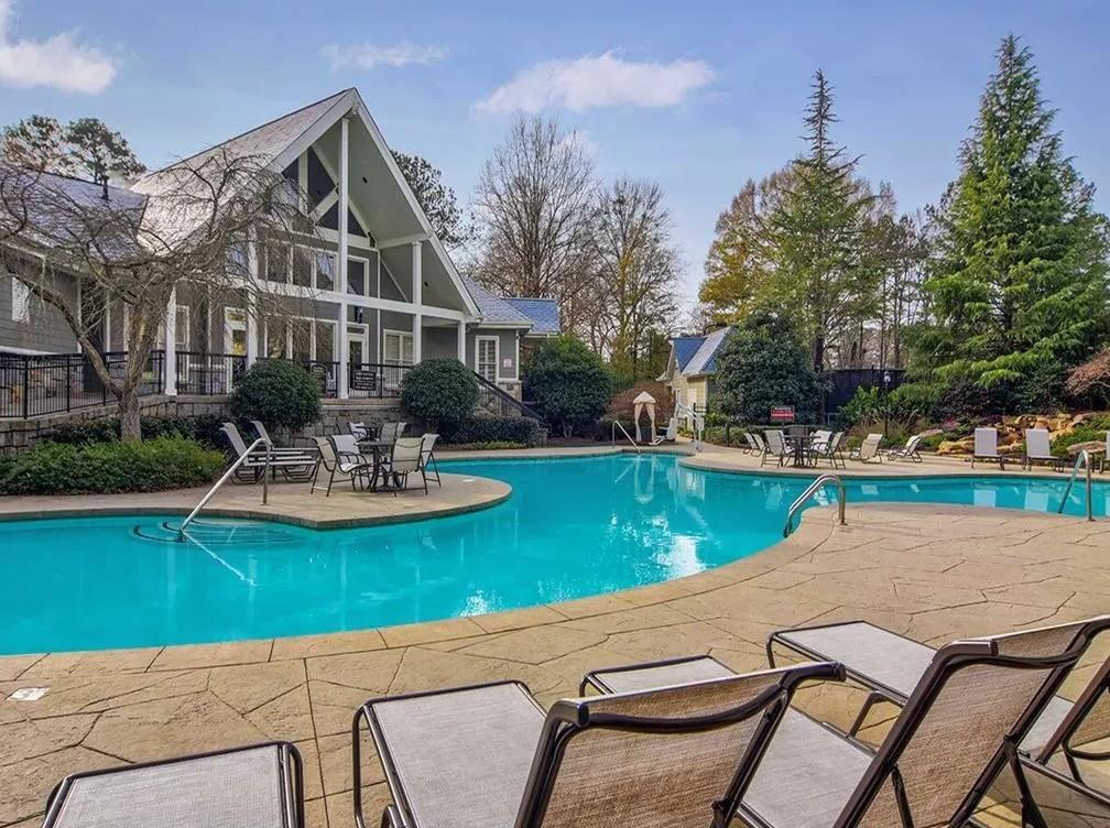 1600 Blairs Bridge Road, Unit 2302 Lithia Springs, GA 30122 - Photo 13 of 21 a view of a patio with swimming pool garden and patio