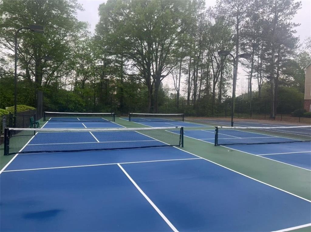 1600 Blairs Bridge Road, Unit 2302 Lithia Springs, GA 30122 - Photo 14 of 21 a tennis court view