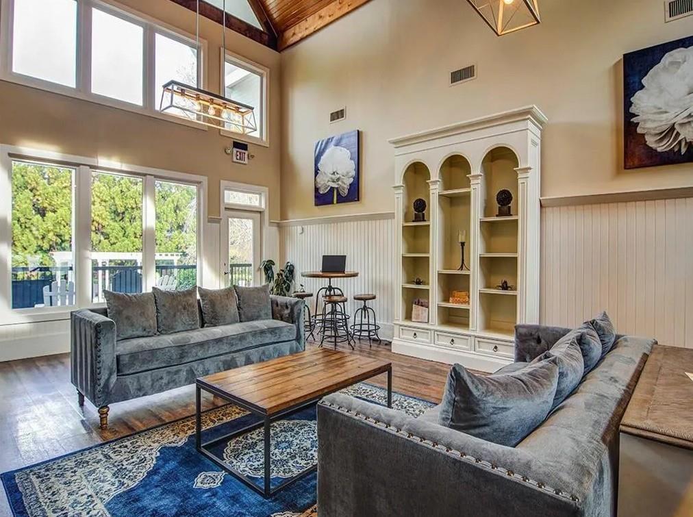 1600 Blairs Bridge Road, Unit 2302 Lithia Springs, GA 30122 - Photo 17 of 21 a living room with furniture and a large window