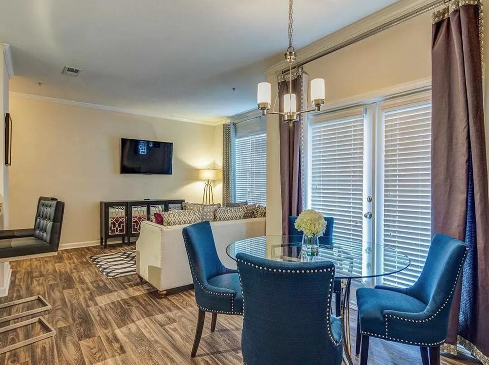 1600 Blairs Bridge Road, Unit 2302 Lithia Springs, GA 30122 - Photo 7 of 21 a dining room with furniture and window