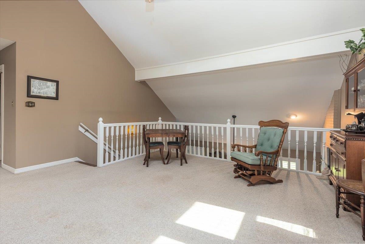 8523 Bazemore Road Memphis, TN 38018 - Photo 8 of 40 a view of a workspace with furniture and a couch