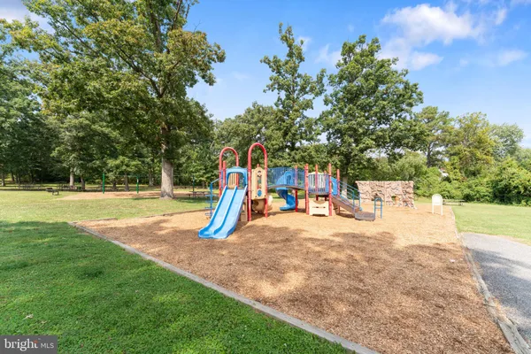 a view of a park with swings