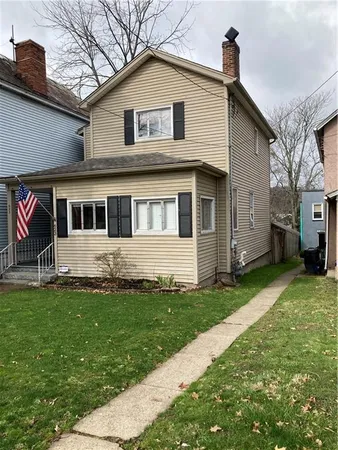 a house view with a garden space