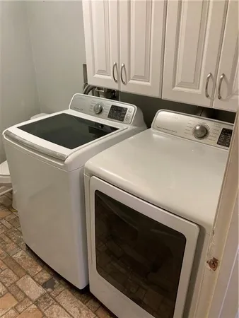 a view of a yard with an outdoor seating