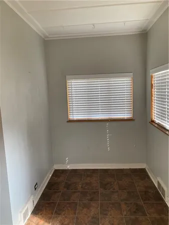 a view of a room that has a window in it