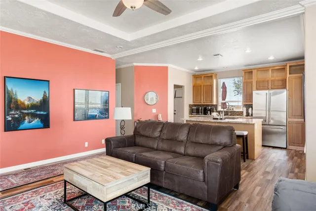 a living room with furniture fireplace and flat screen tv