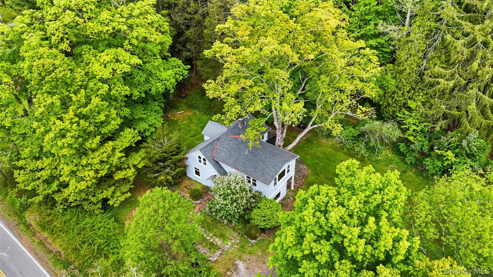 726 Wittenberg Road Mount Tremper, NY 12457 - Photo 32 of 32 a view of a house with a yard