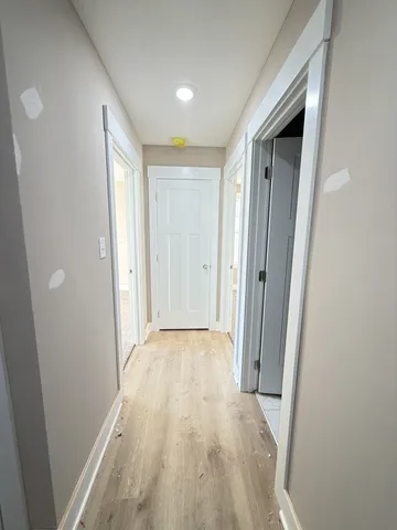 a view of a room with racks on the wall