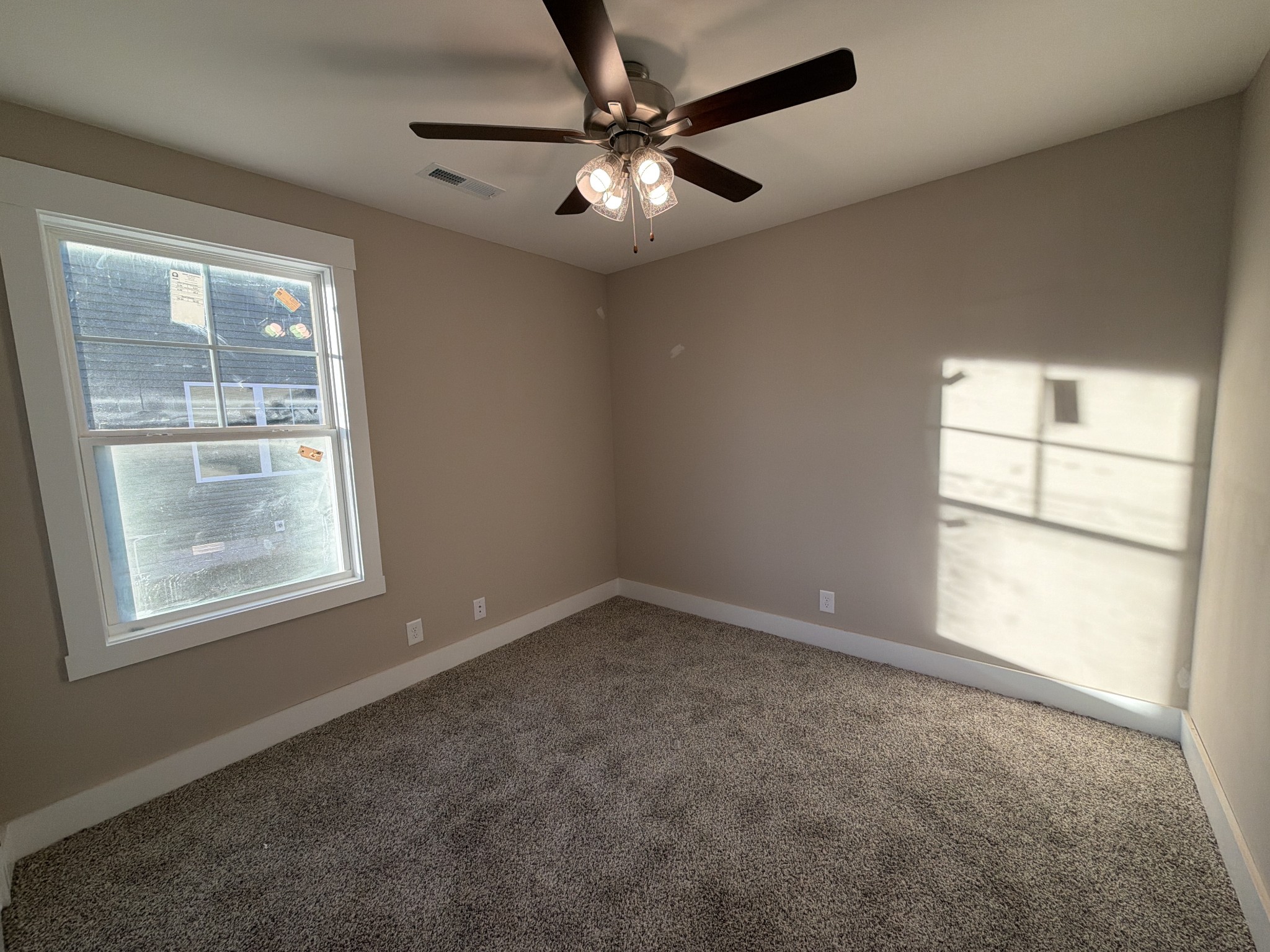 630 Avondale Road Oak Grove, KY 42262 - Photo 15 of 23 an empty room with windows and fan