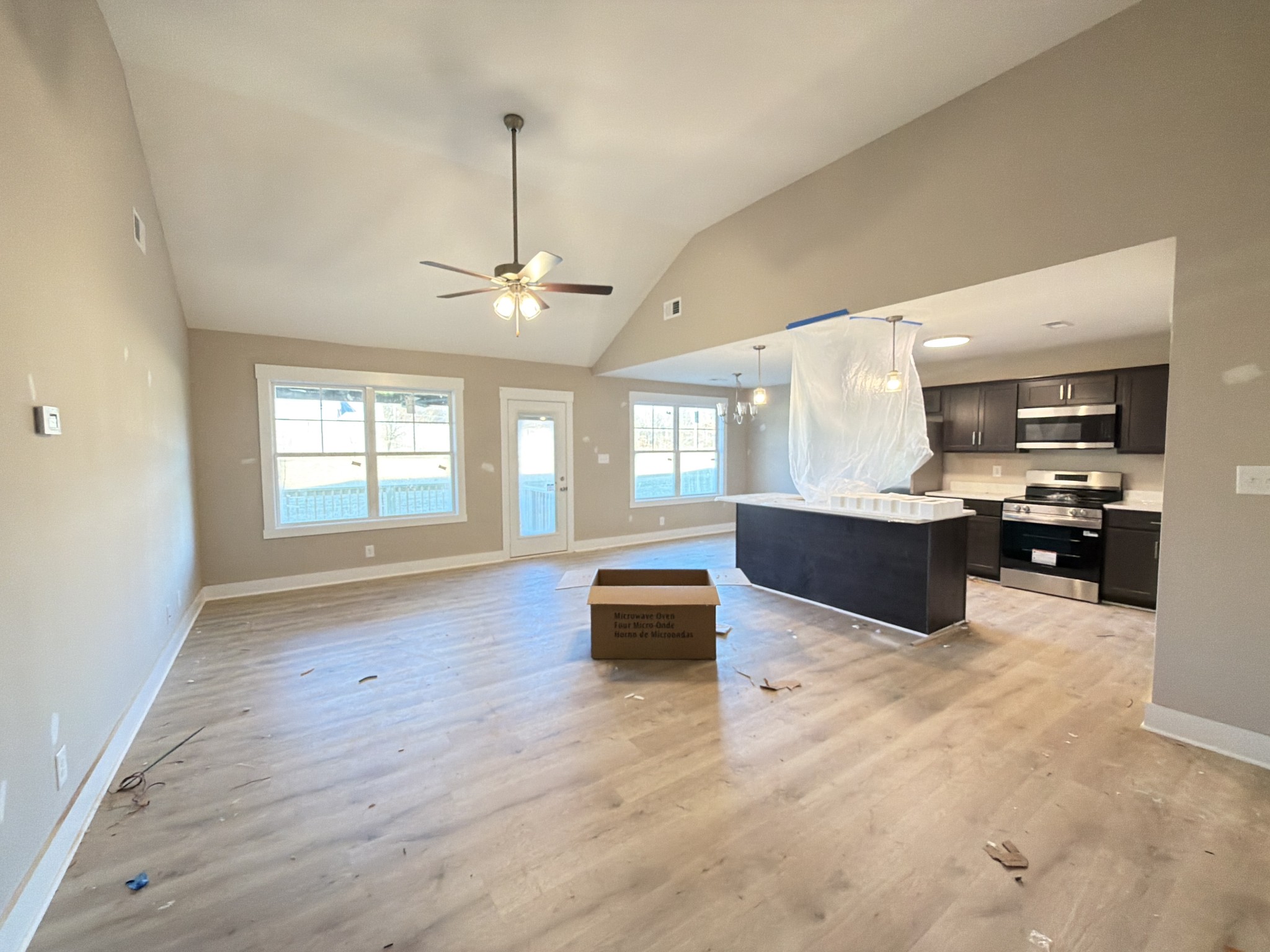 630 Avondale Road Oak Grove, KY 42262 - Photo 4 of 23 a large kitchen with a refrigerator and a stove top oven