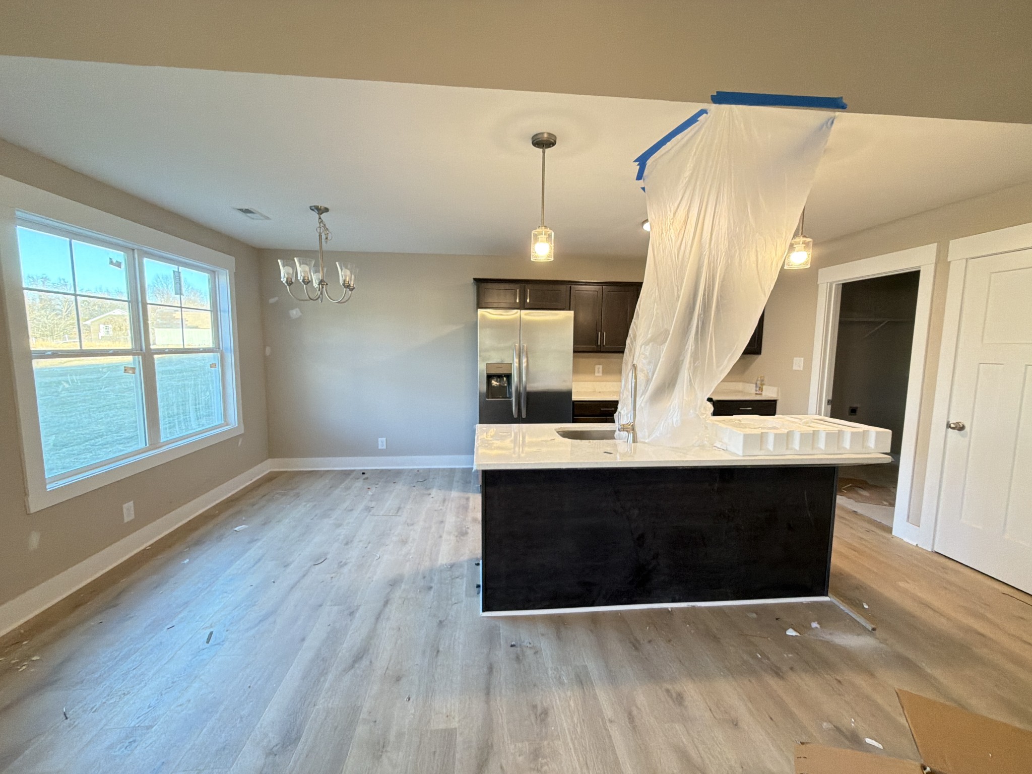 630 Avondale Road Oak Grove, KY 42262 - Photo 5 of 23 a view of living room with wooden floor and large window