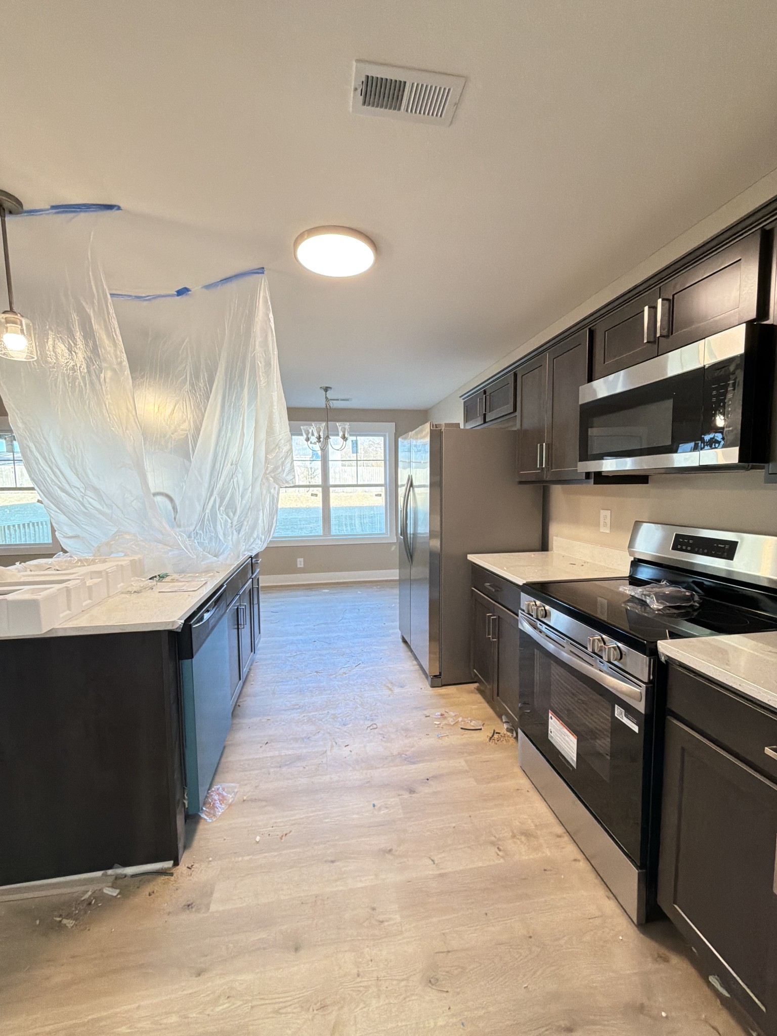 630 Avondale Road Oak Grove, KY 42262 - Photo 8 of 23 a large kitchen with stainless steel appliances and large cabinets