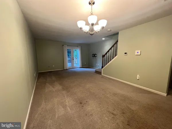 a view of a livingroom with a chandelier