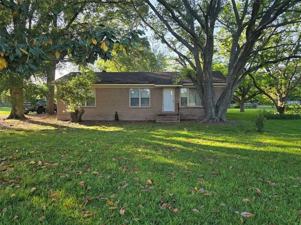 a house view with a garden space