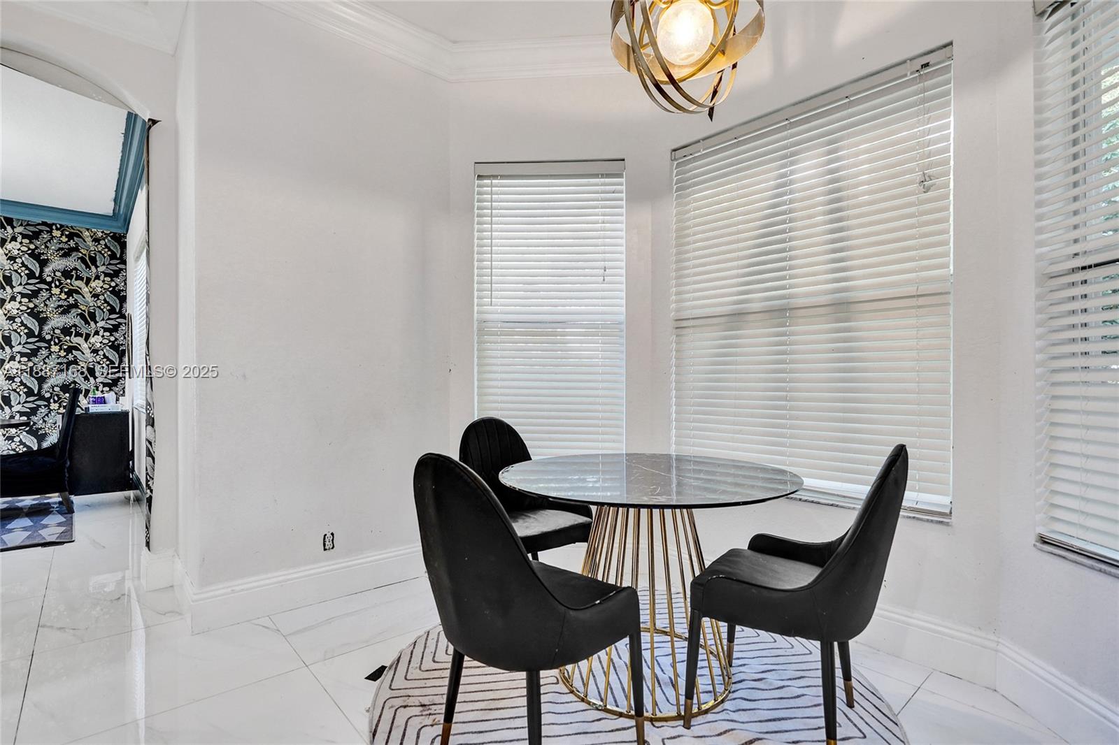 8824 Cobblestone Point Circle Boynton Beach, FL 33472 - Photo 17 of 53 a view of a dining room with furniture and a window