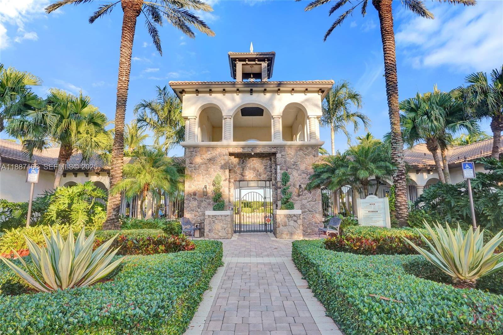8824 Cobblestone Point Circle Boynton Beach, FL 33472 - Photo 44 of 53 a front view of a house with a yard