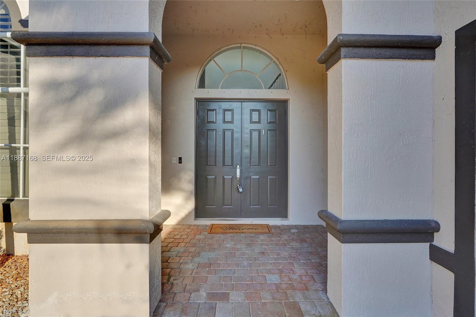 8824 Cobblestone Point Circle Boynton Beach, FL 33472 - Photo 5 of 53 a view of entryway with a front door
