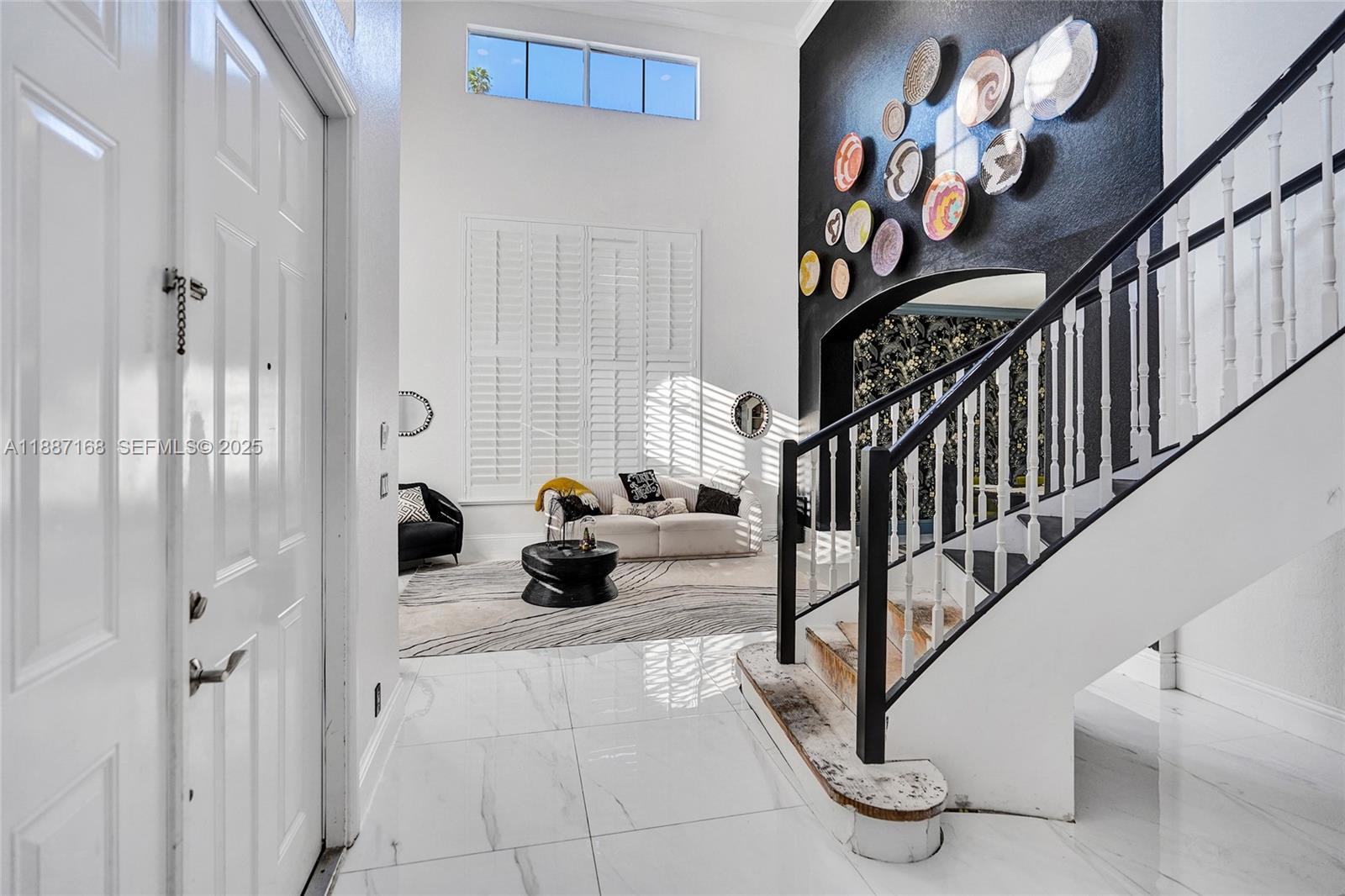 8824 Cobblestone Point Circle Boynton Beach, FL 33472 - Photo 9 of 53 a view of entryway and workspace