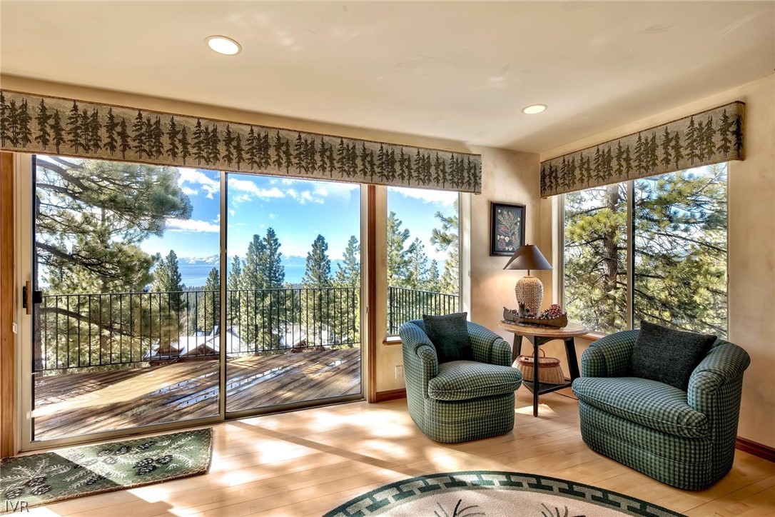 545 Alpine View Drive Incline Village, NV 89451 - Photo 19 of 34 a living room with furniture and a floor to ceiling window