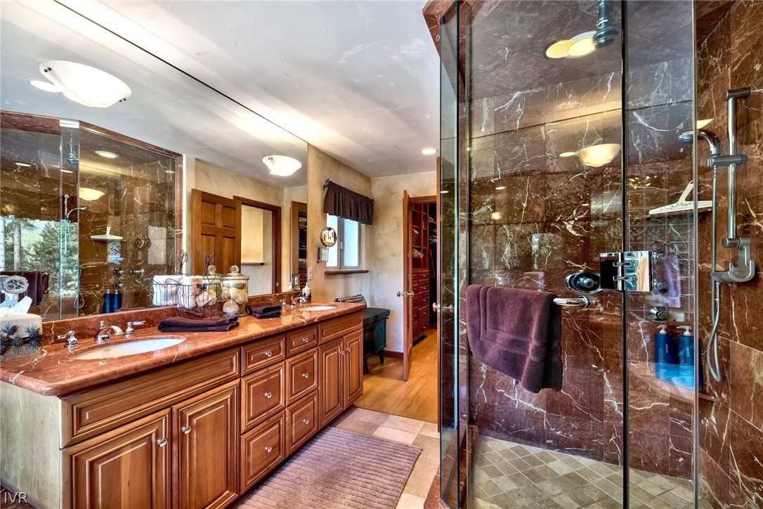 545 Alpine View Drive Incline Village, NV 89451 - Photo 21 of 34 a spacious bathroom with double vanity and a mirror
