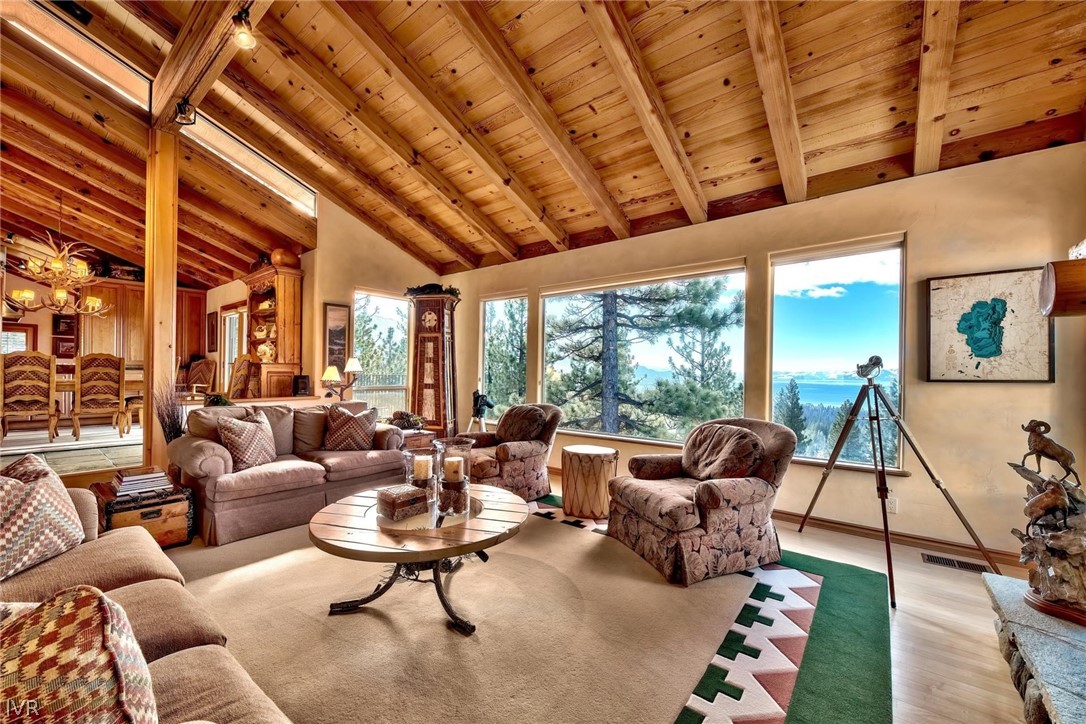 545 Alpine View Drive Incline Village, NV 89451 - Photo 8 of 34 a living room with furniture a rug and a large window
