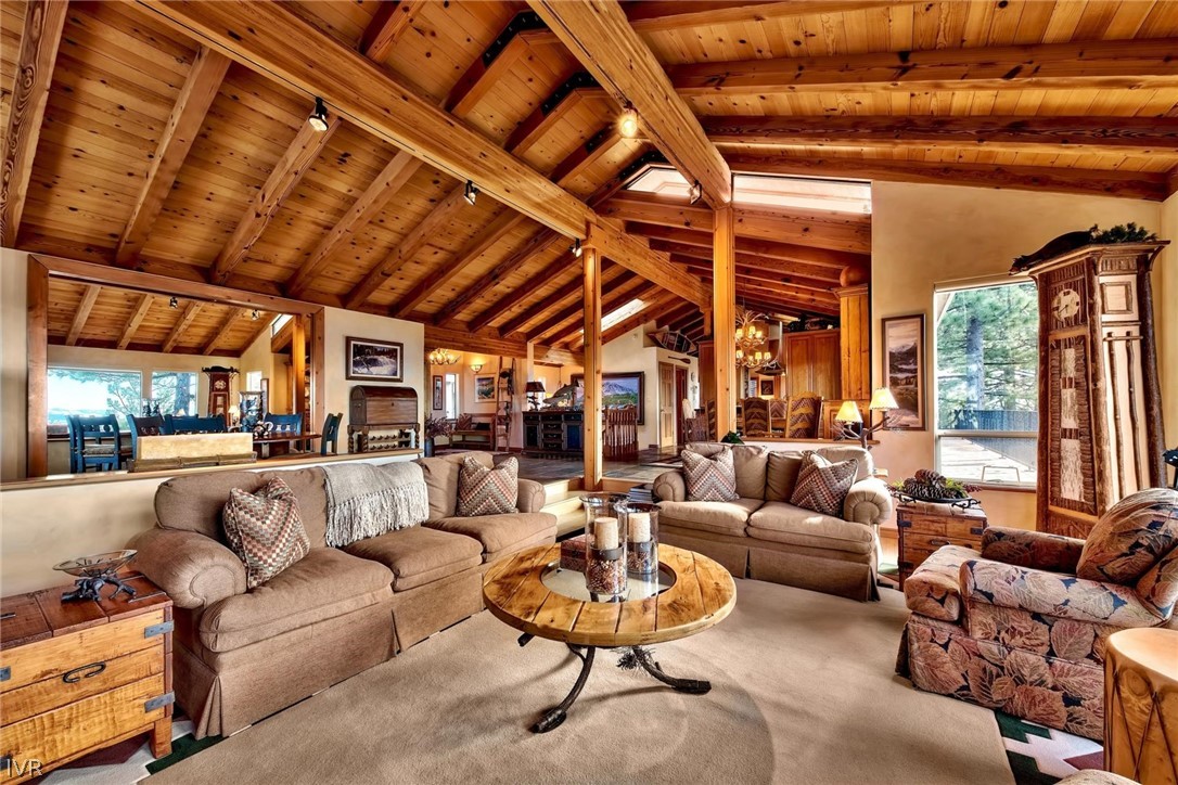 545 Alpine View Drive Incline Village, NV 89451 - Photo 10 of 34 a living room with furniture a ceiling fan and a rug