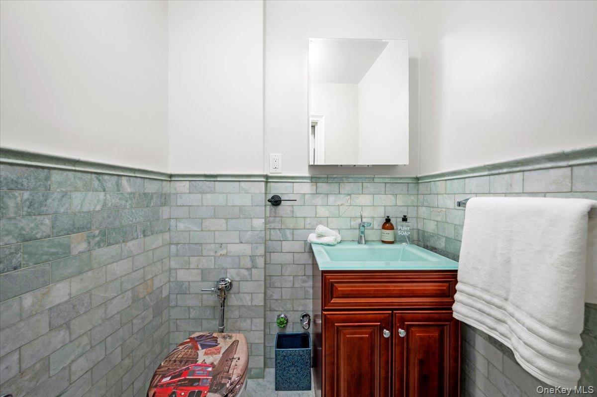 45 Pondfield Road West, Unit 4C Bronxville, NY 10708 - Photo 18 of 30 a bathroom with a sink and a shower