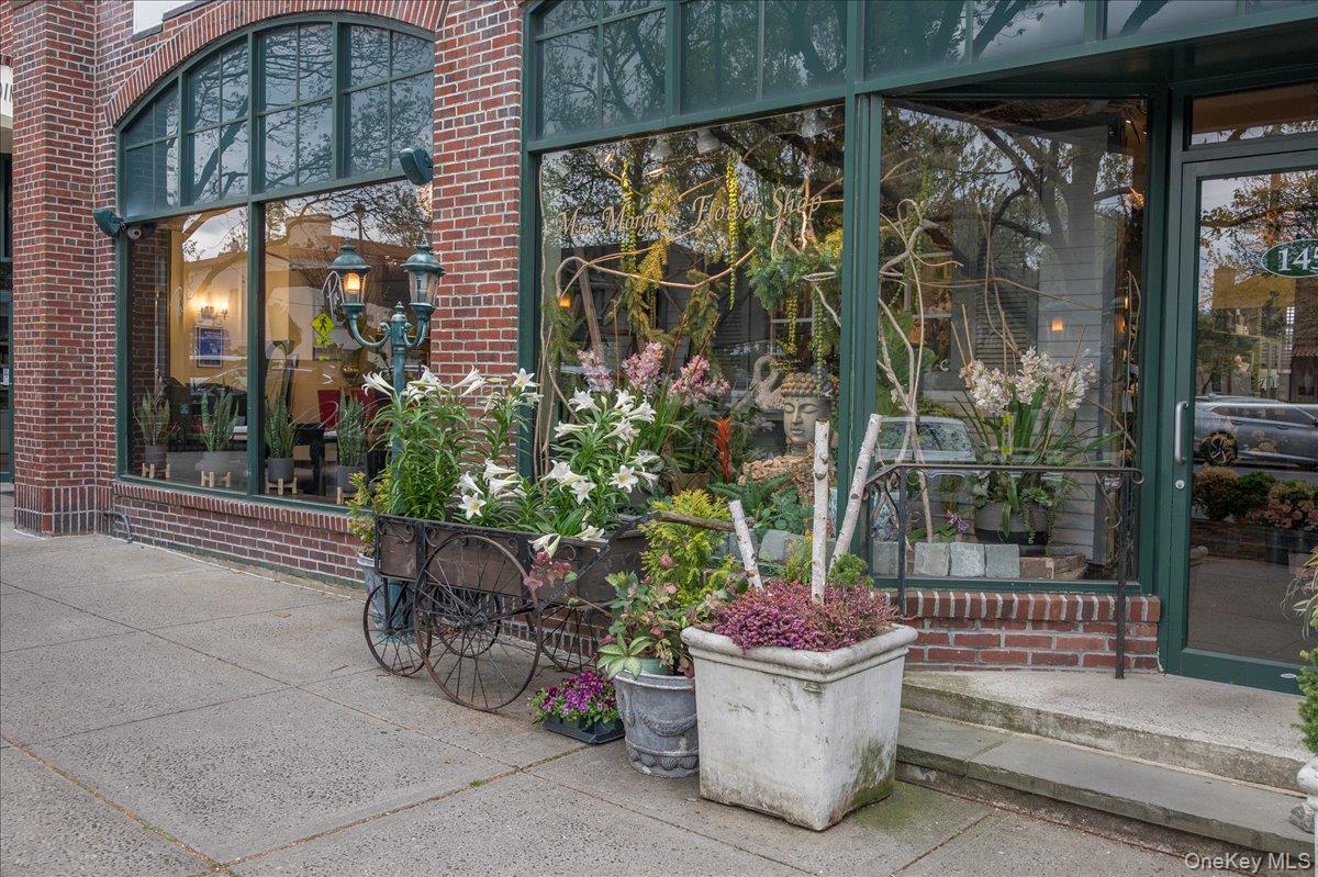 45 Pondfield Road West, Unit 4C Bronxville, NY 10708 - Photo 24 of 30 a house view with a outdoor space