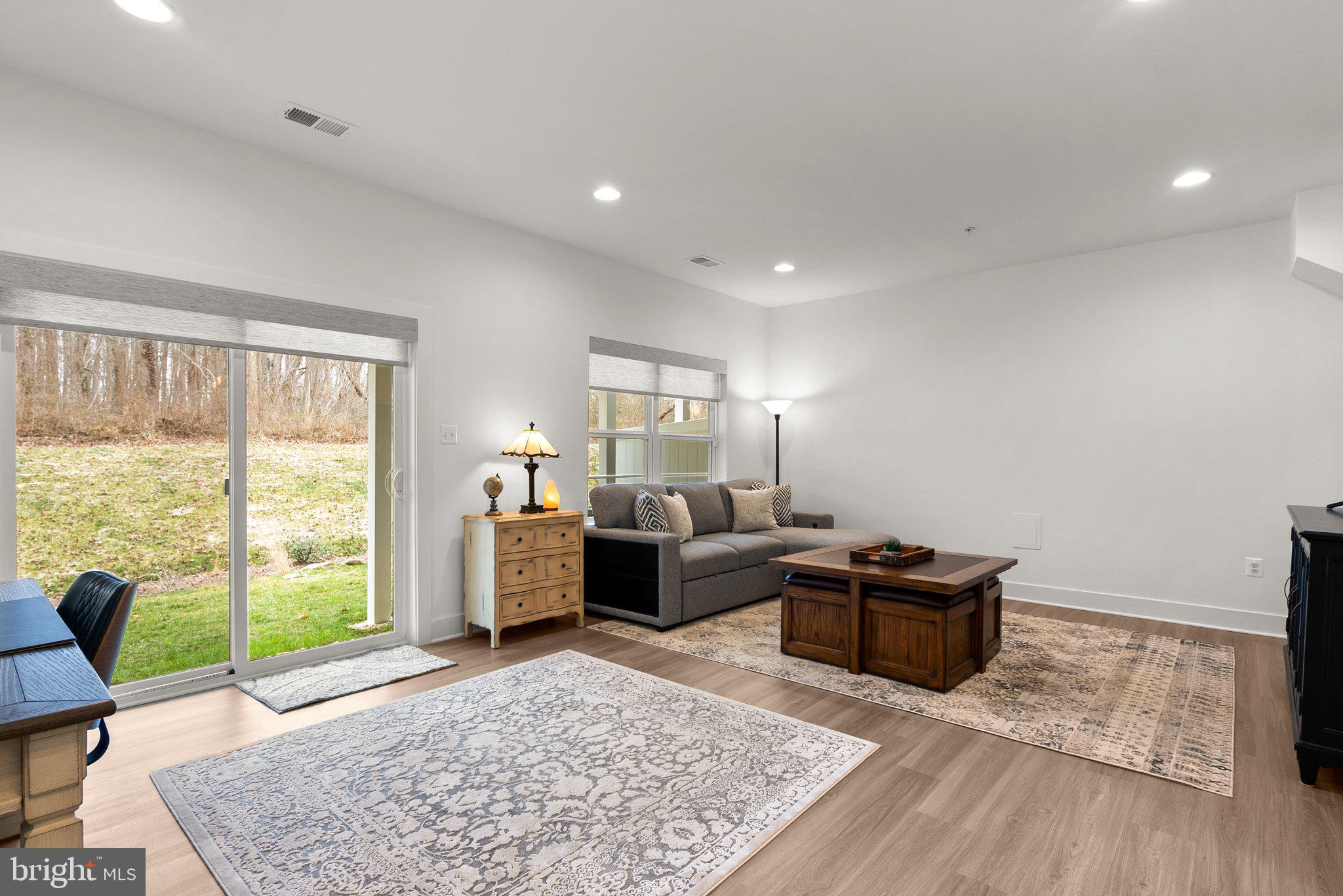 286 Alluvium Drive Laurel, MD 20724 - Photo 33 of 61 a living room with furniture and a rug