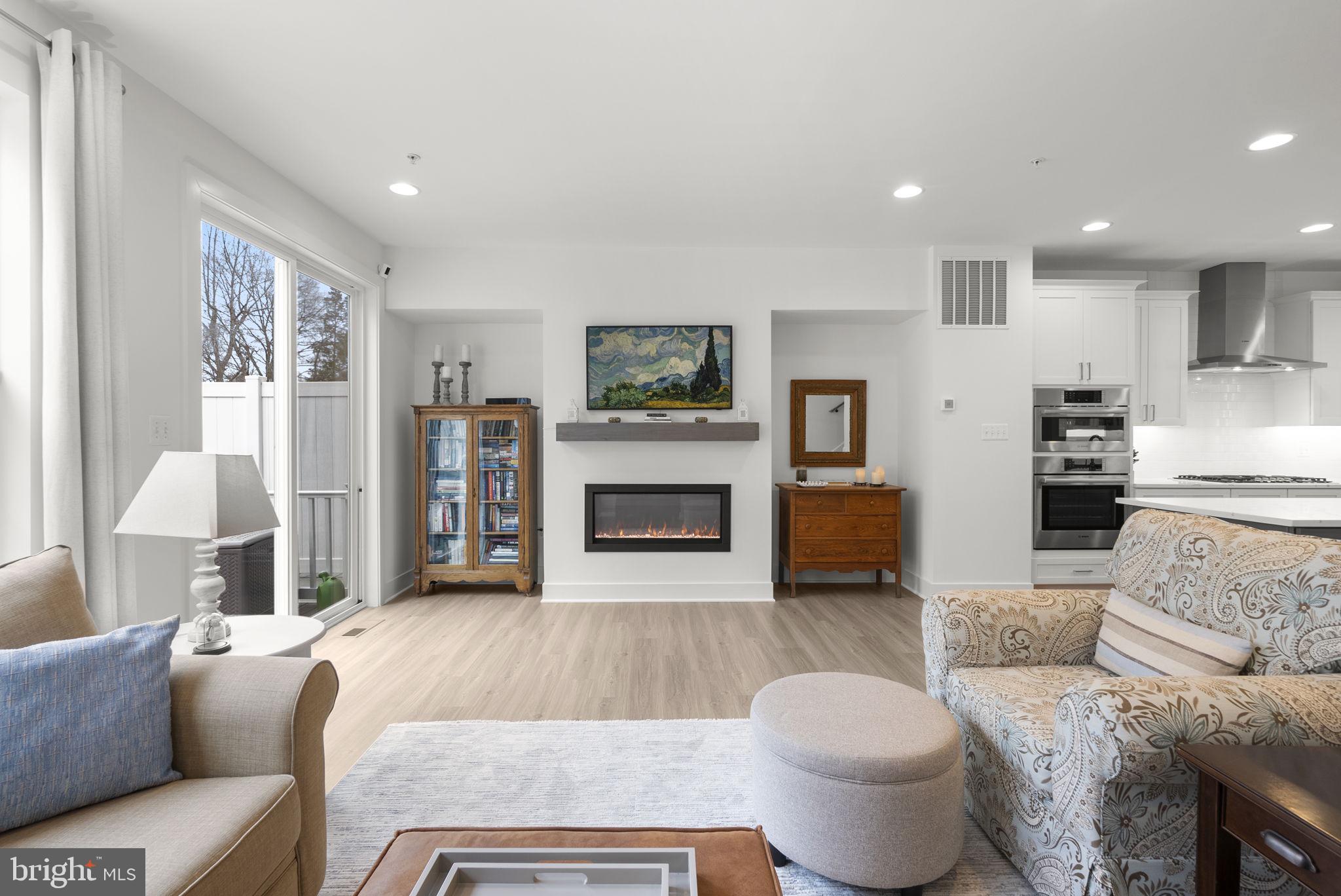 286 Alluvium Drive Laurel, MD 20724 - Photo 6 of 61 a living room with furniture and a fireplace