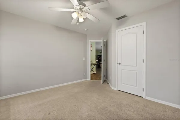 an empty room with a bathroom