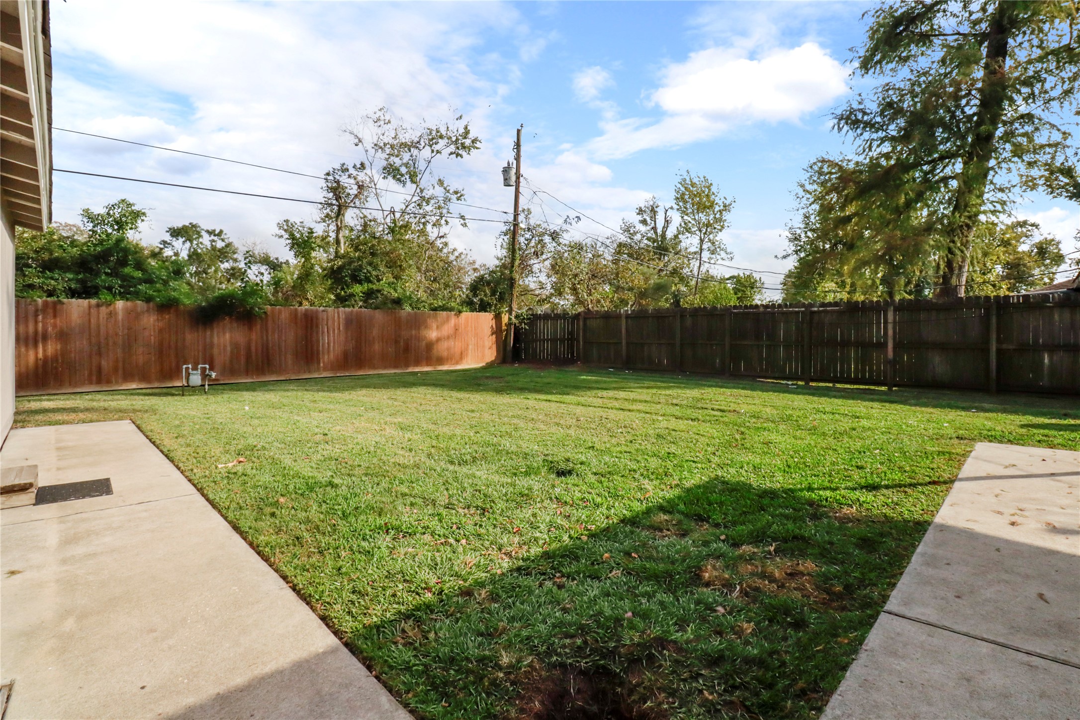 916 North Chenango Street Angleton, TX 77515 - Photo 14 of 15 a view of swimming pool with a yard
