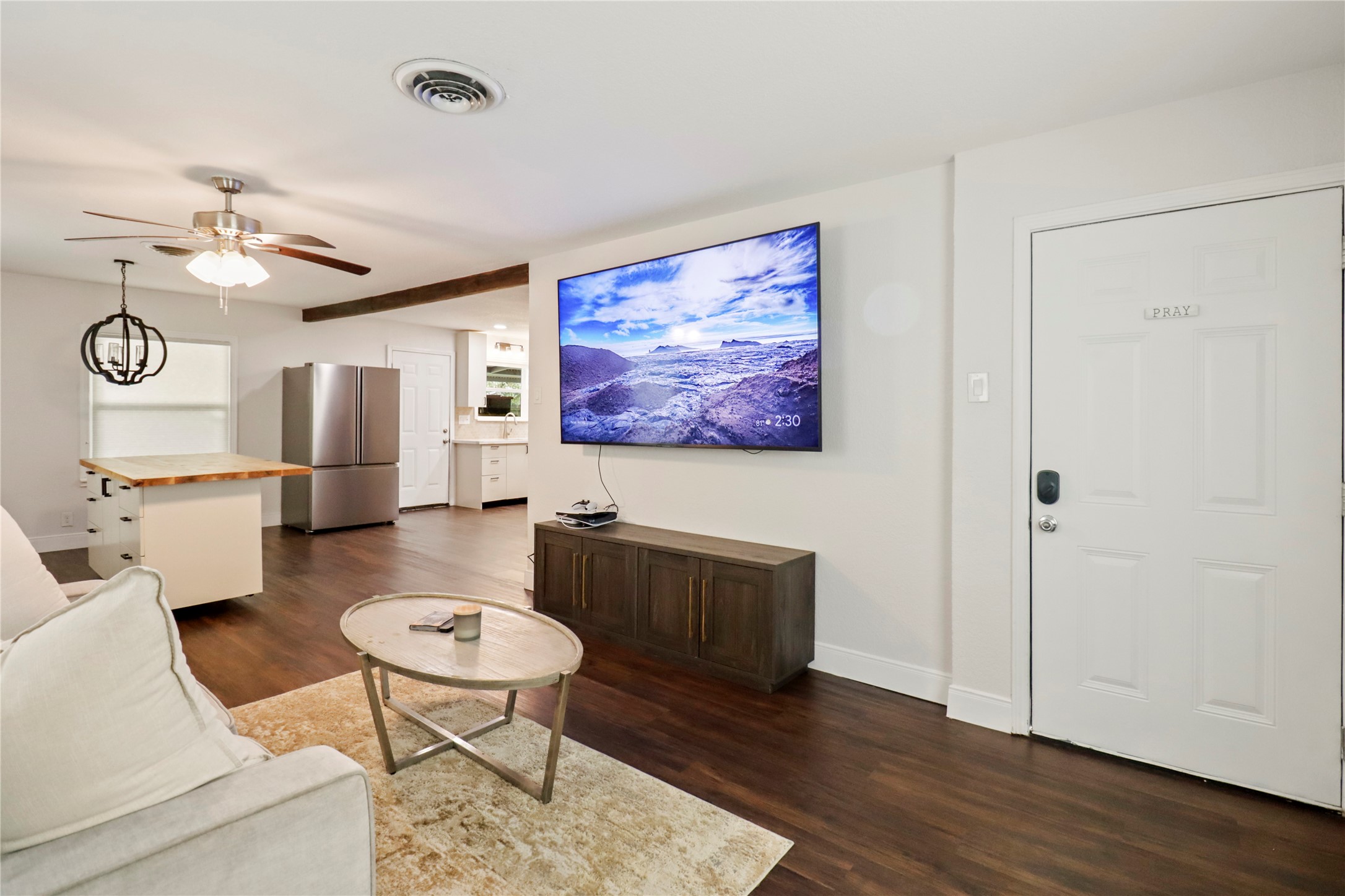 916 North Chenango Street Angleton, TX 77515 - Photo 6 of 15 a living room with furniture and wooden floor