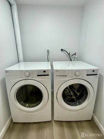 a utility room with dryer and washer