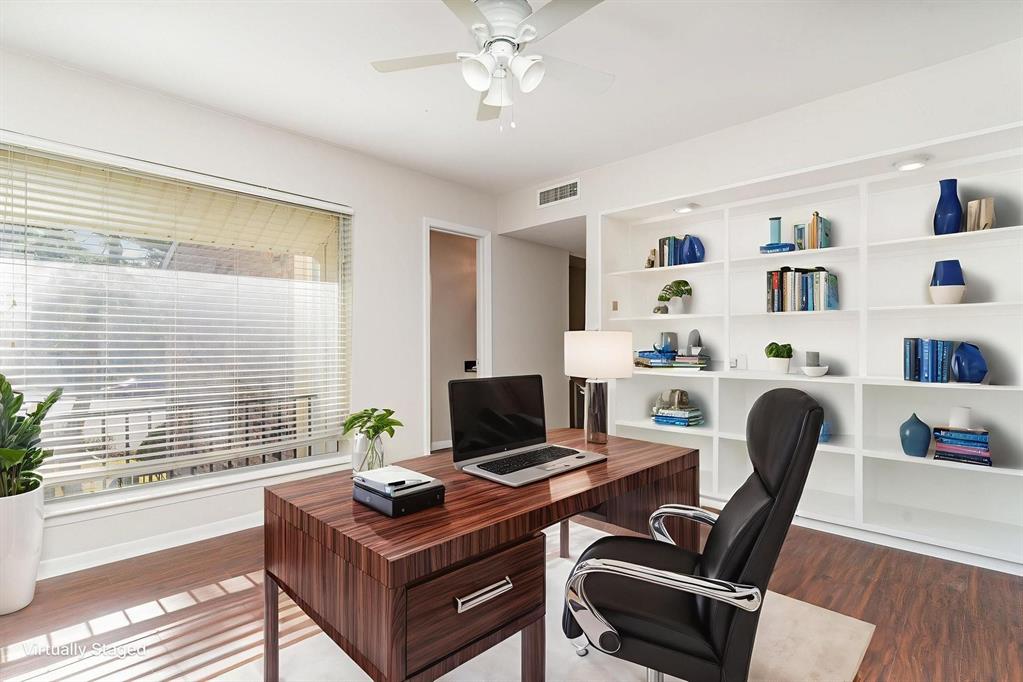 2945 Country Pl Circle Carrollton, TX 75006 - Photo 20 of 29 a view of a workspace with furniture and a window