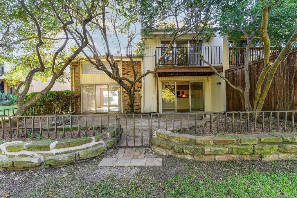 2945 Country Pl Circle Carrollton, TX 75006 - Photo 23 of 29 a view of a house with a yard