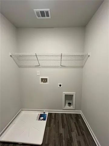 a view of a room with racks on the wall