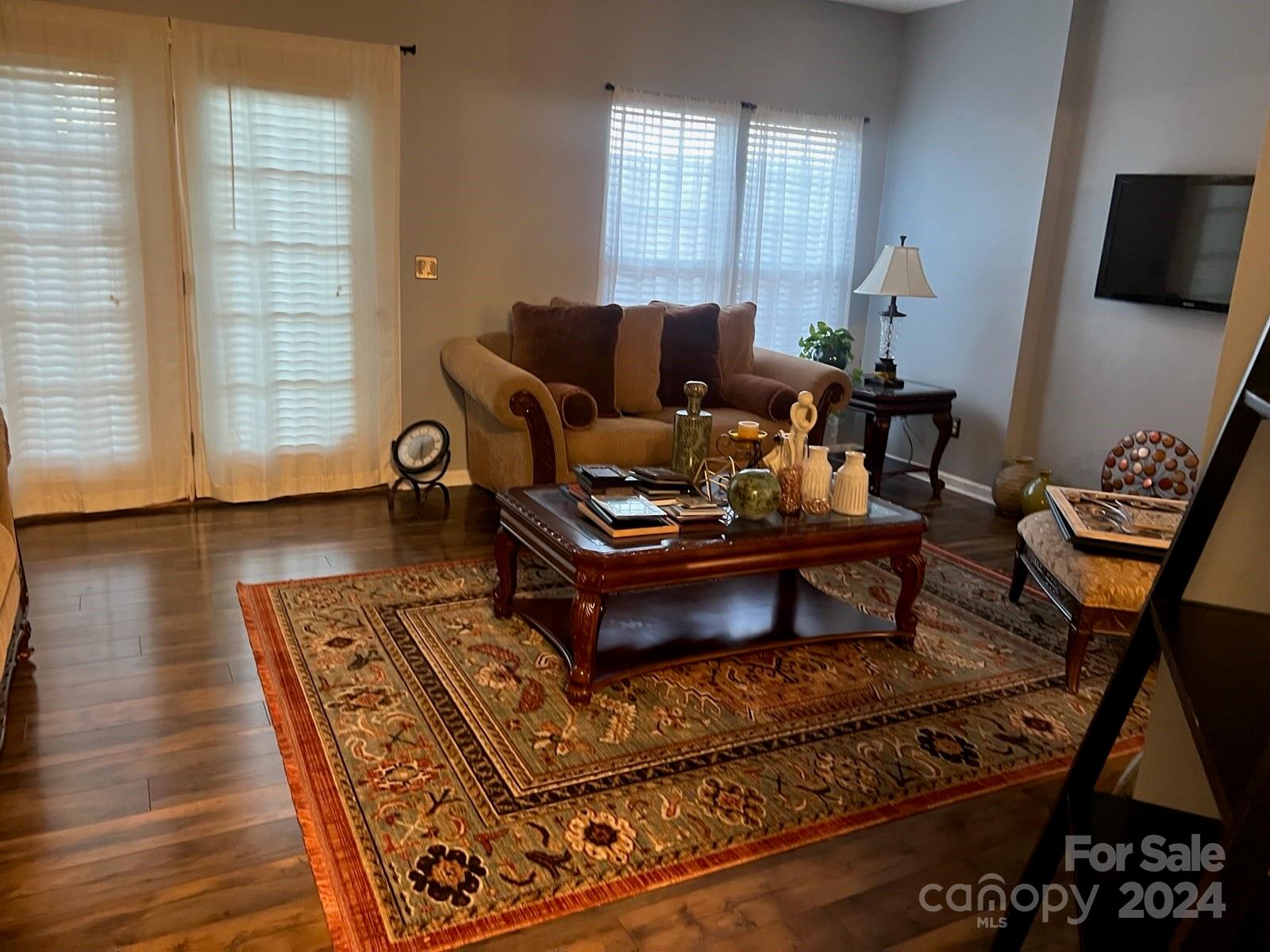 1264 Branson Road Northwest Concord, NC 28027 - Photo 20 of 37 a living room with furniture and a flat screen tv