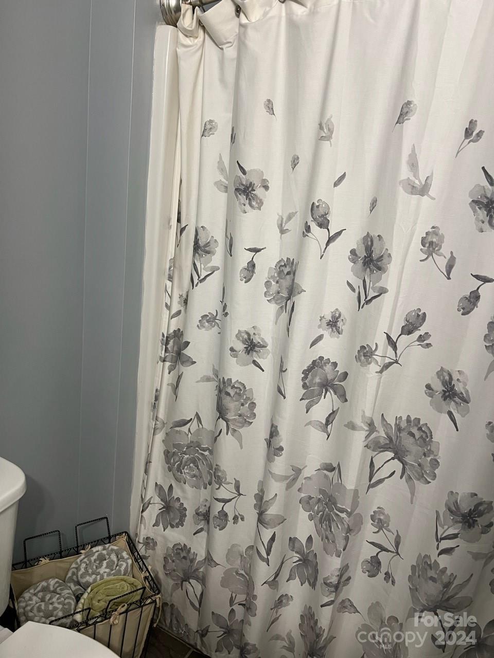 1264 Branson Road Northwest Concord, NC 28027 - Photo 23 of 37 a bathroom with a shower curtain