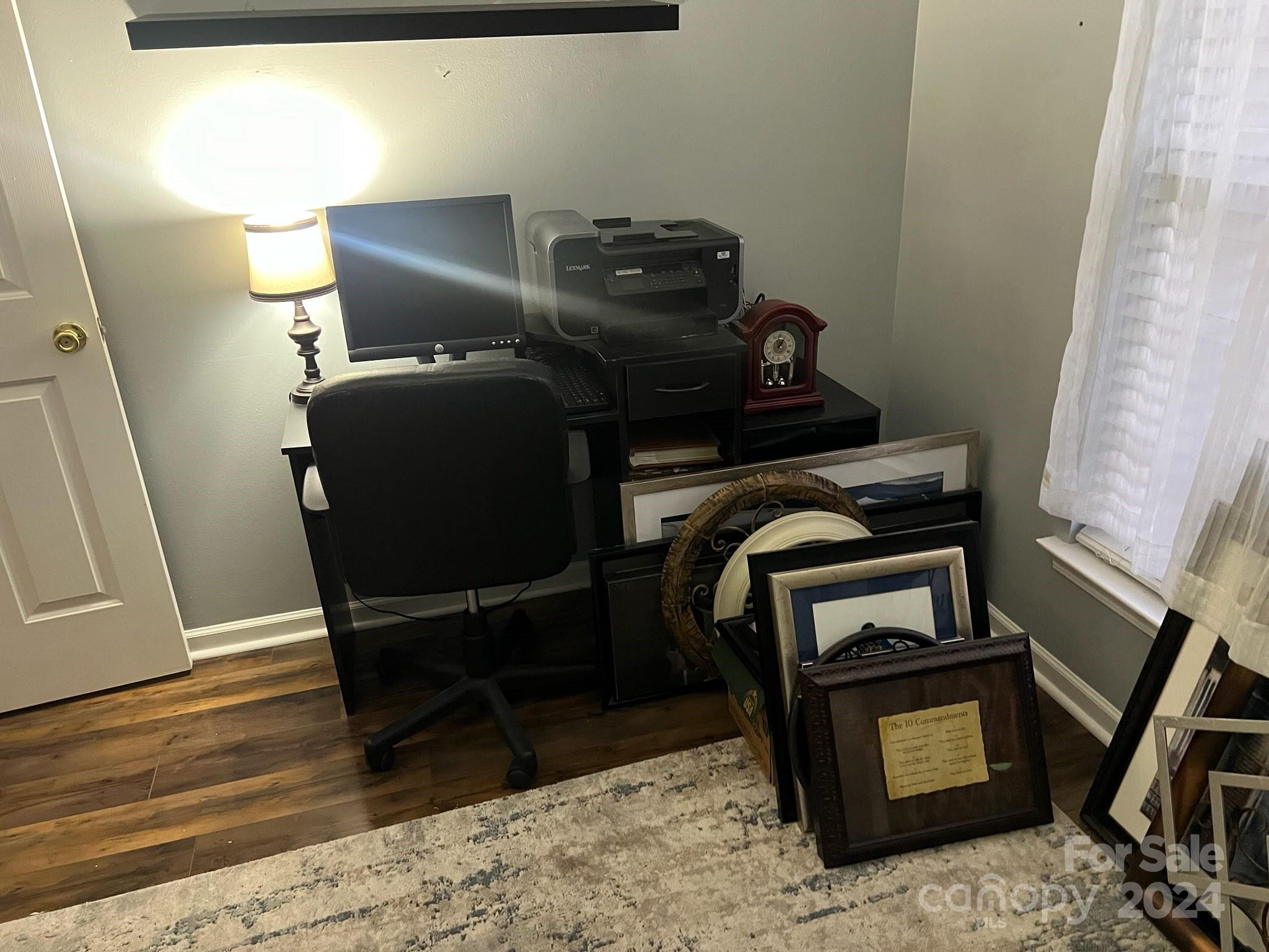 1264 Branson Road Northwest Concord, NC 28027 - Photo 24 of 37 a view of workspace with chair and wooden floor
