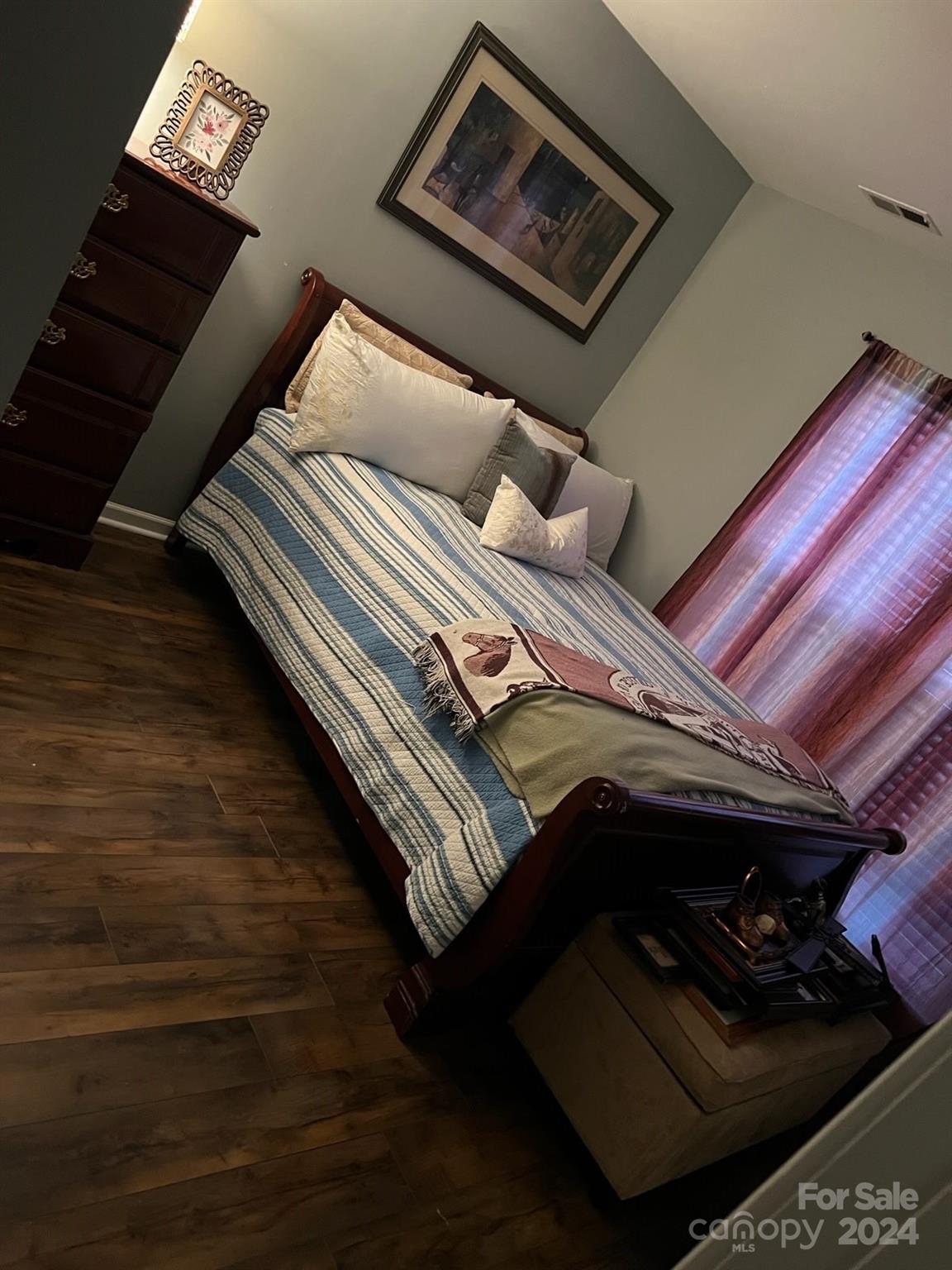 1264 Branson Road Northwest Concord, NC 28027 - Photo 27 of 37 a bedroom with bed and a walk in closet