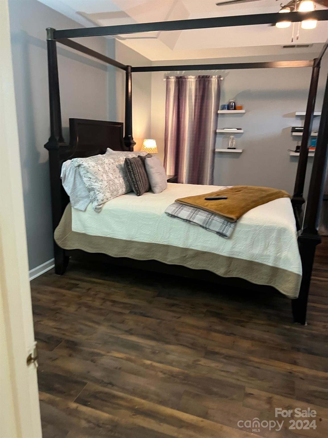 1264 Branson Road Northwest Concord, NC 28027 - Photo 31 of 37 a bedroom with a bed and wooden floor