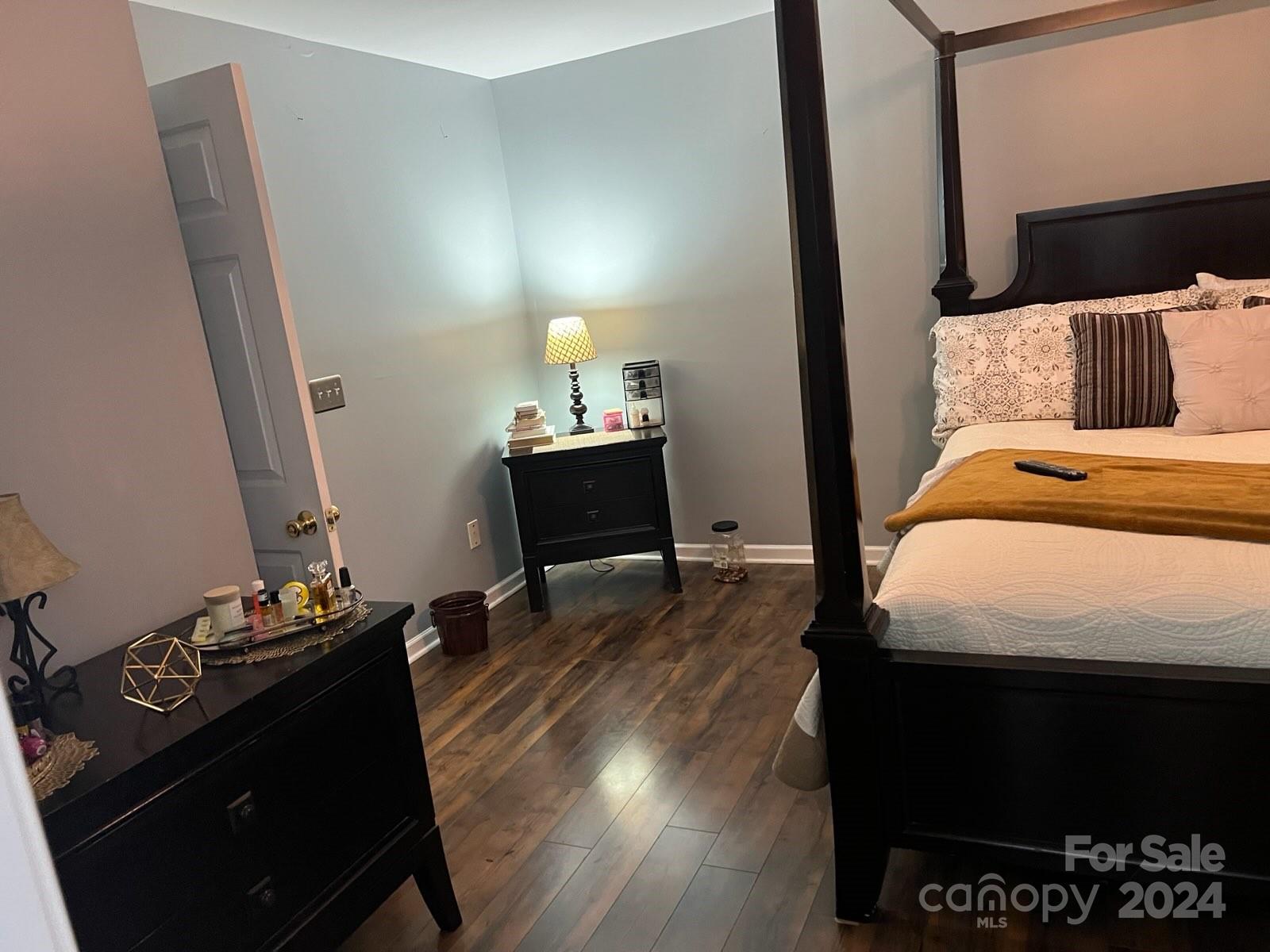 1264 Branson Road Northwest Concord, NC 28027 - Photo 33 of 37 a bedroom with a bed and wooden floor