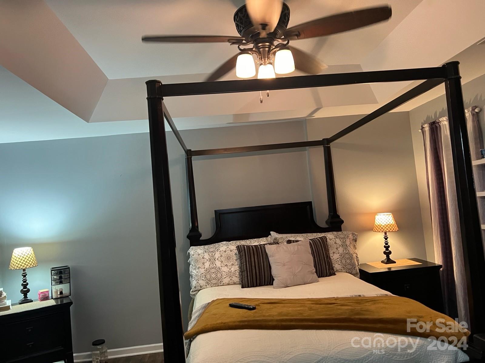 1264 Branson Road Northwest Concord, NC 28027 - Photo 34 of 37 a bedroom with a bed and a mirror