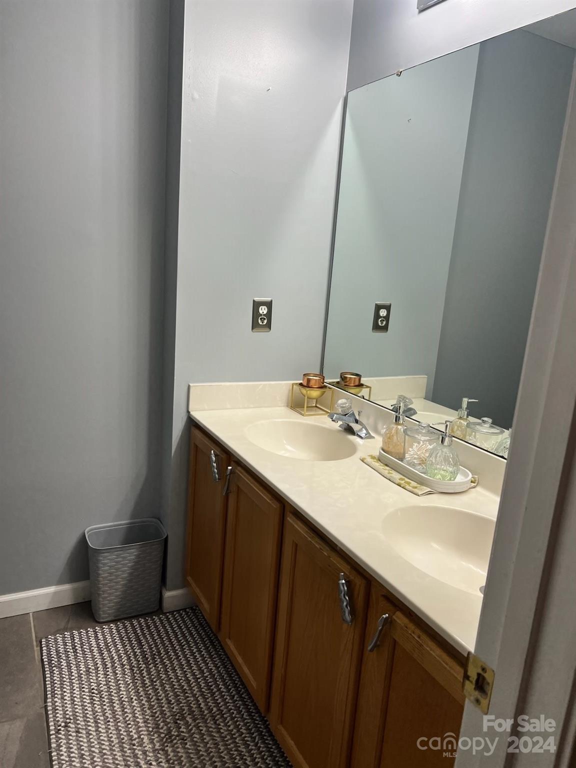 1264 Branson Road Northwest Concord, NC 28027 - Photo 35 of 37 a bathroom with a sink and a mirror