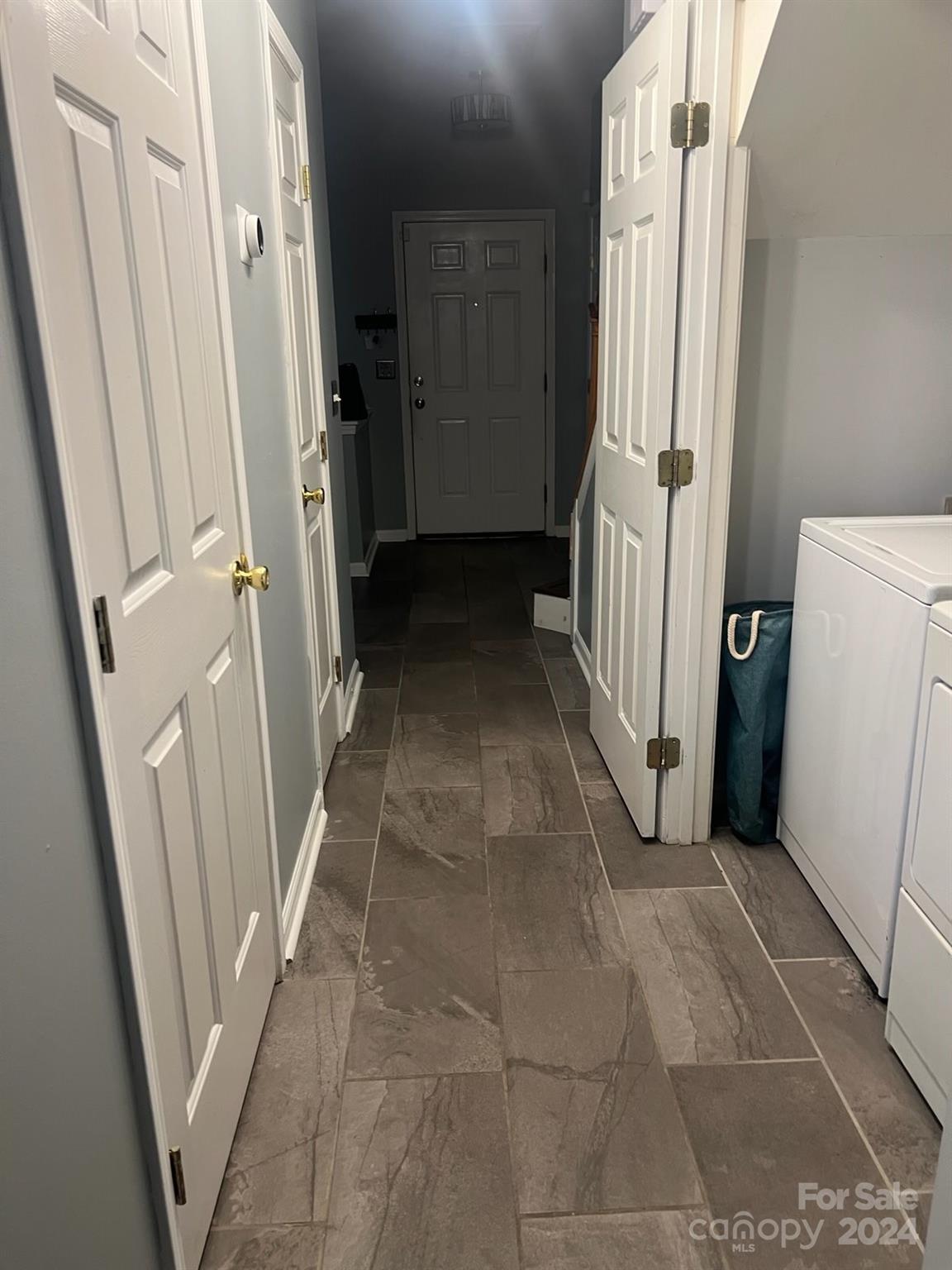 1264 Branson Road Northwest Concord, NC 28027 - Photo 10 of 37 a view of a hallway with a white door and a window