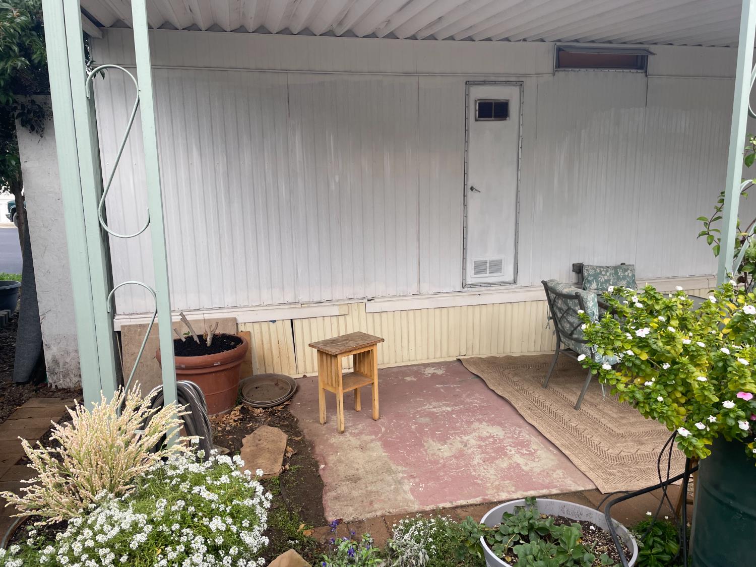 5835 Cherokee Road, Unit 42 Stockton, CA 95215 - Photo 18 of 24 a view of a chairs and table in a kitchen