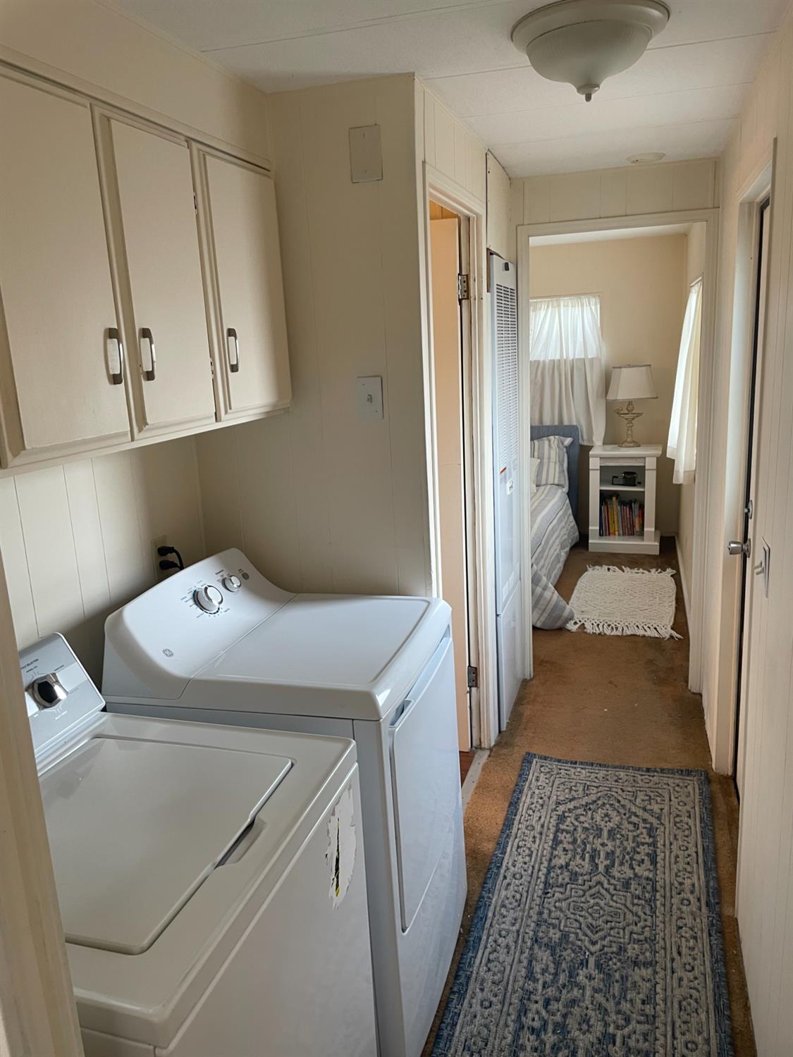 5835 Cherokee Road, Unit 42 Stockton, CA 95215 - Photo 7 of 24 a utility room with dryer and washer